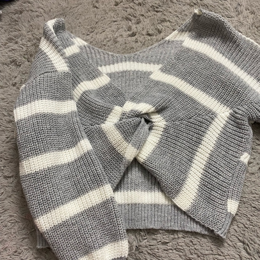 not in the front, cute sweater
